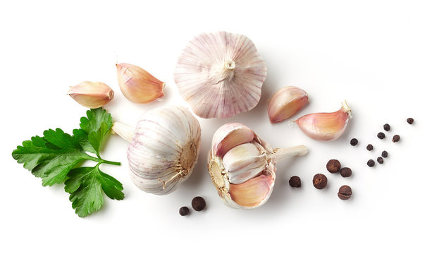 garlic, parsley and pepper on white background