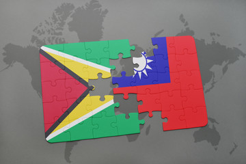 puzzle with the national flag of guyana and taiwan on a world map
