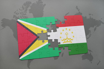puzzle with the national flag of guyana and tajikistan on a world map