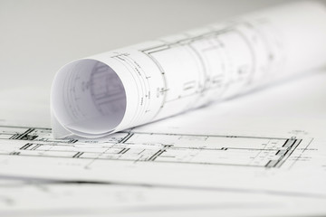 Architect rolls and house plans, close up
