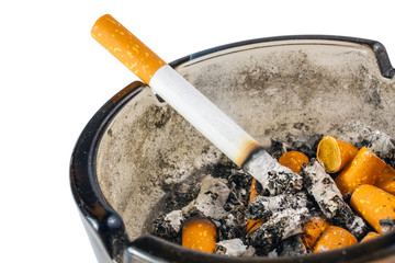 Close up of cigarette in ashtray on white background