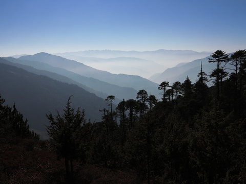 Bhutan - Morning mist in the mountains