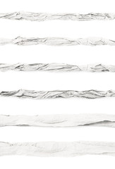 Obraz premium Line of crubled paper isolated