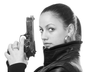 Girl holding gun isolated on white background