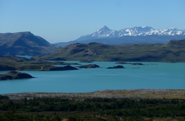 The majestic views of Southern Patagonia, a bright blue lake in the beautiful Torres del Paine National Park