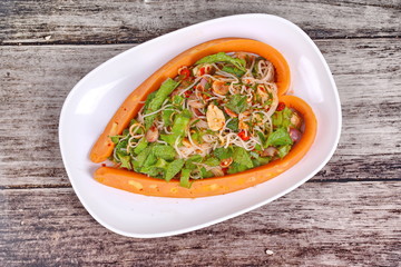Sausage cheese wrap spicy sour vegetable salad with rice noodle .