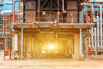 Petrochemical oil refinery, Refinery oil and gas industry, The equipment of oil refining, Close-up of Pipelines and petrochemical industrial plant towers view of oil and gas refinery