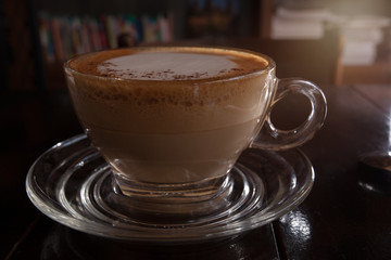 Coffee in glass on the table.