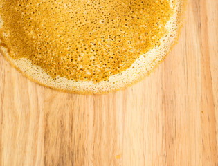 Thin Pancakes on a Wooden Background Top View. Fresh Homemade Crepes