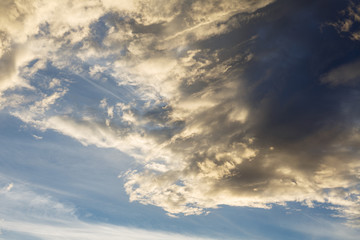 Fototapeta na wymiar Cumulus clouds against a blue sky. Overcast. Cyclone. Weather forecast.