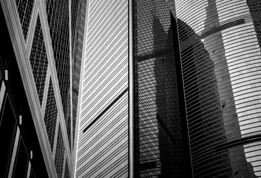 windows of commercial building in Hong Kong with B&W color