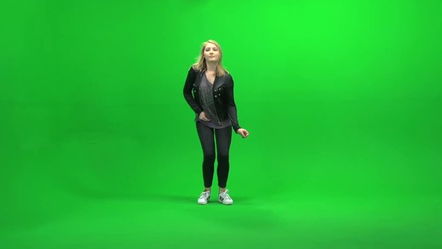 Women Dancing Hip Hop Against Green Screen Studio