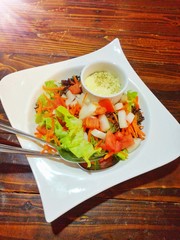 Fresh cream salad in white dish 