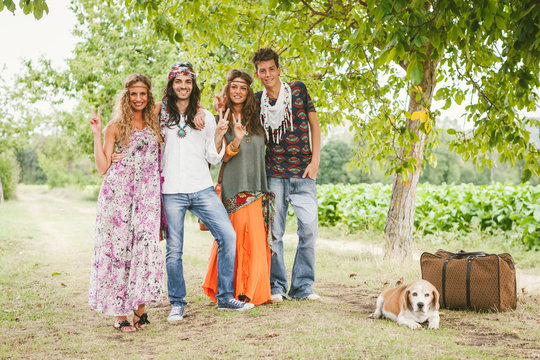 Friends in hippie style with a dog