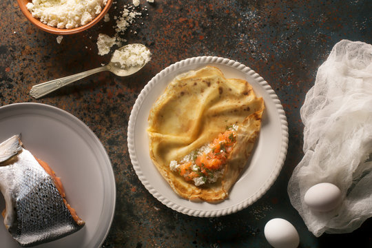 Russian-style pancakes with lox