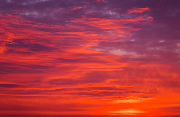 Bright orange, red and yellow colors sunset sky. Apocalyptic sunset sky Background