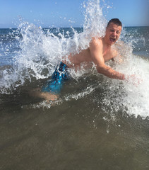 Man in Ocean Wave