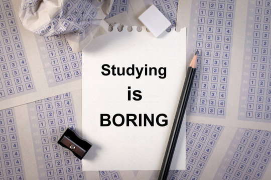 Filling out in answer sheet, pencil, sharpener, paper reduction and the word studying is boring.Set of multiple choice answer sheet.