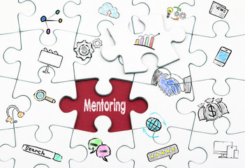 Mentoring concept. White last piece of a Puzzle.