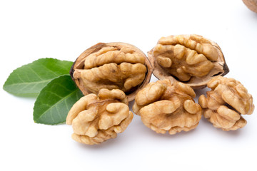 Walnut and walnut kernel isolated on the white background.