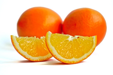 Closeup of oranges on a white background