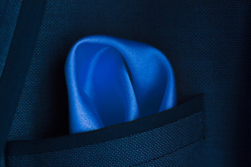 blue handkerchief in a pocket - obrazy, fototapety, plakaty