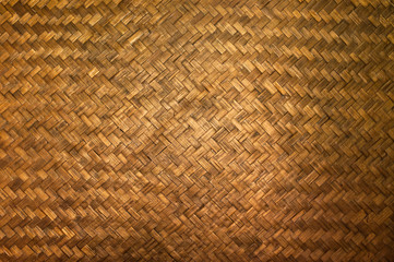 Dark Texture of bamboo handicraft detail , Pattern of Thai style bamboo handcraft texture background , vintage wall