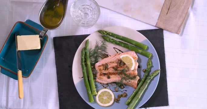 Stop motion view of the preparation of salmon with capers, dill and balsamic vinegar