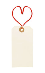 cardboard tag with red heart ribbon isolated on white background