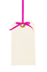 cardboard tag with pink ribbon and bow isolated on white background