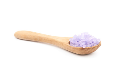 Spoon full of salt crystals isolated