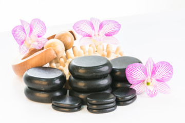 Spa with hot stones, massage roller and cellulite massager close up