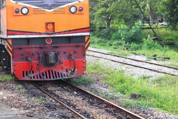 locomotive train running on rails station  of in travel in Thailand