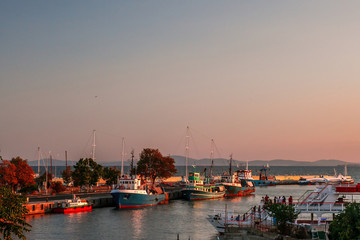 Fototapeta na wymiar Boats on the dock at sunset in Old Nessebar, Bulgaria. 