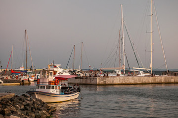 Boats on the dock at the Old Nessebar, Bulgaria at sunset.
