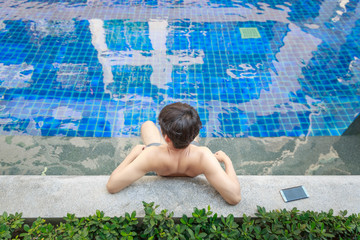 Handsome Asian Man Enjoy In Swimming Pool