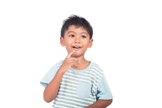 Cute Little Asian Boy Thinking And Smiling