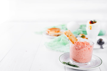 mousse in a jar with crackers,