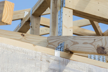roof rafter and ceiling joist with blue sky background - obrazy, fototapety, plakaty
