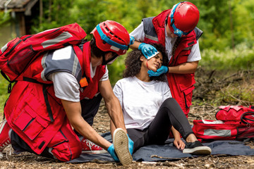 Rescue team helping injured victim