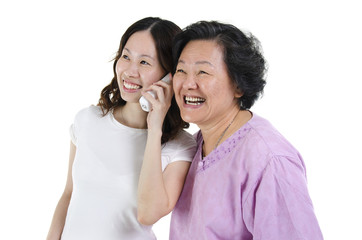Daughter and mother calling on phone