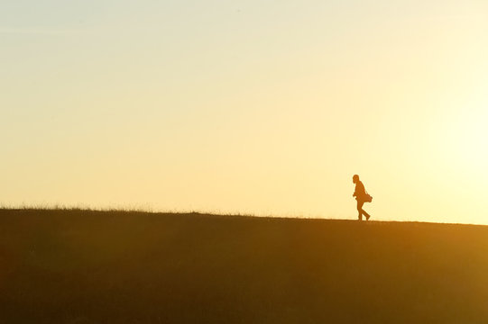 siluate man on mountain
