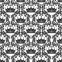 Royal Seamless Pattern. Crown and floral vintage tracery isolated on a white background.