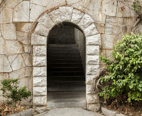 Fototapeta na wymiar stone arch with internal stairs