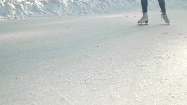 girl skates on a sunny day