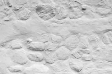 Steinwand in weiß als Textur mit Struktur