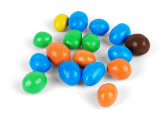 Closeup of colorful chocolate candies on white