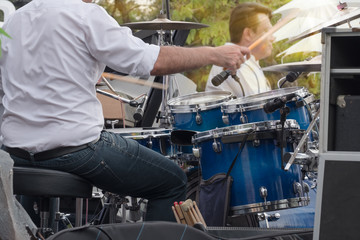 Fototapeta premium Drum / View of musician playing drum in concert. Movement.
