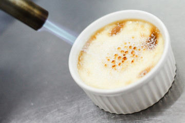 burn portion of creme brulee dessert