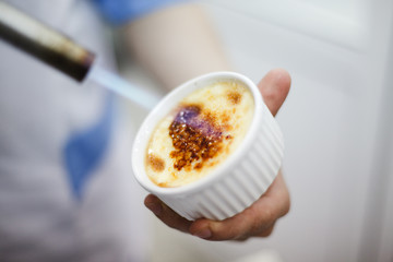 burn portion of creme brulee dessert
